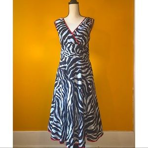 Amanda Lane sz 12, zebra print dress with red trim.